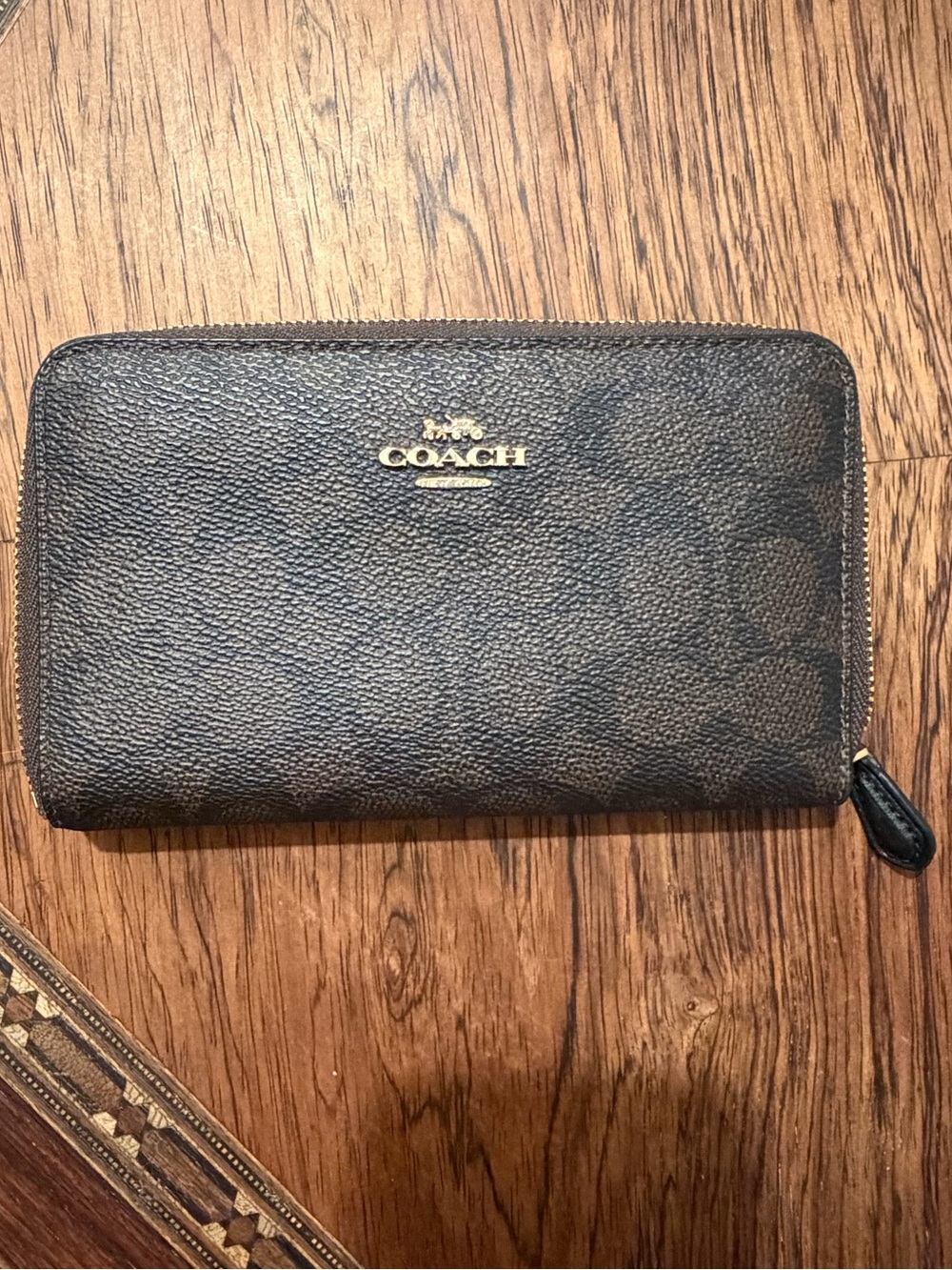 NWT Coach Coated Canvas Zip Wallet in Black and Walnut.
